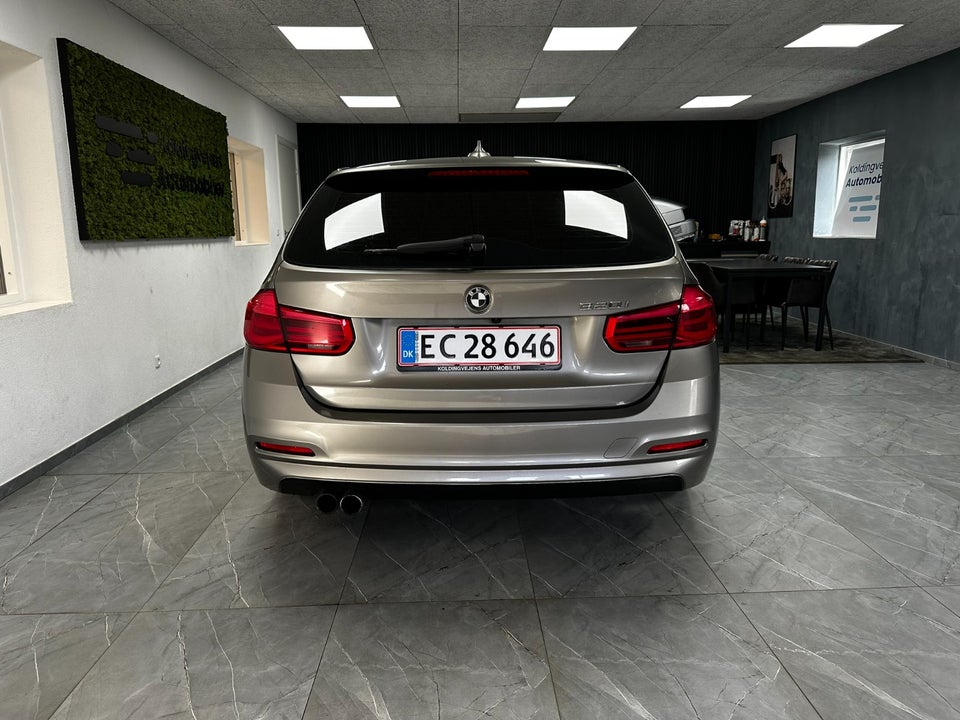 BMW 320i 2,0 Touring aut. 5d