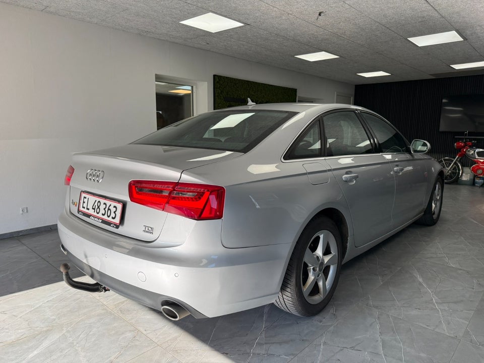 Audi A6 3,0 TDi 245 quattro S-tr. 4d