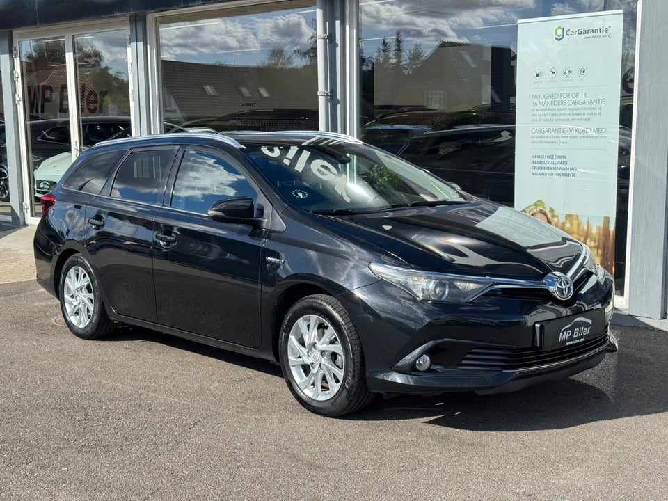 Toyota Auris 1,8 Hybrid H2 Comfort Touring Sports CVT 5d