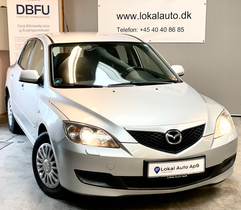 Mazda 3 1,6 DE Touring 5d