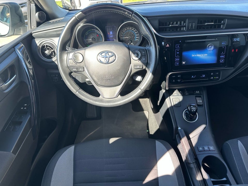 Toyota Auris 1,8 Hybrid H2 Comfort Touring Sports CVT 5d