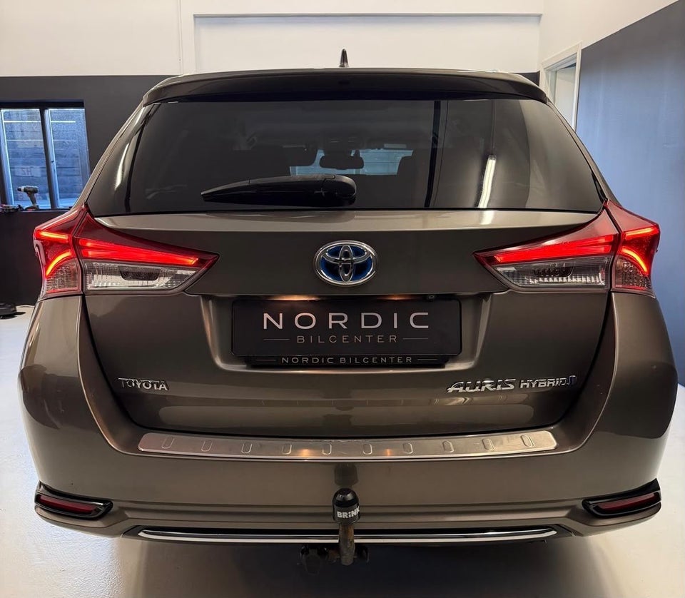 Toyota Auris 1,8 Hybrid H2 Comfort Touring Sports CVT 5d