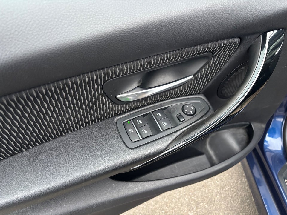 BMW 320i 2,0 aut. 4d