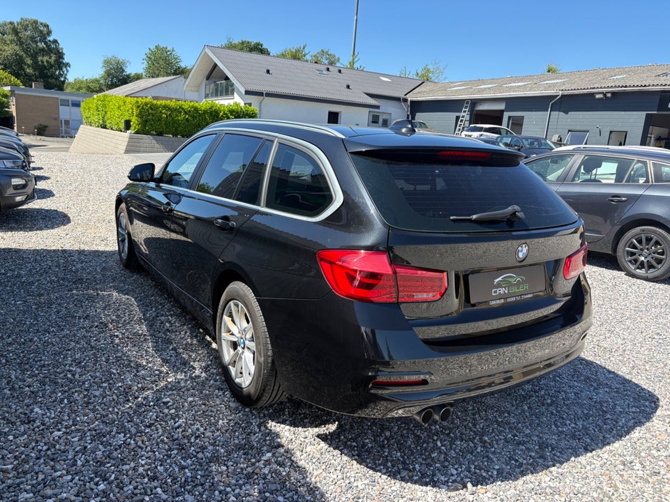 BMW 320i 2,0 Touring aut. 5d
