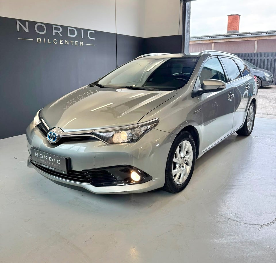 Toyota Auris 1,8 Hybrid H2 Comfort Touring Sports CVT 5d