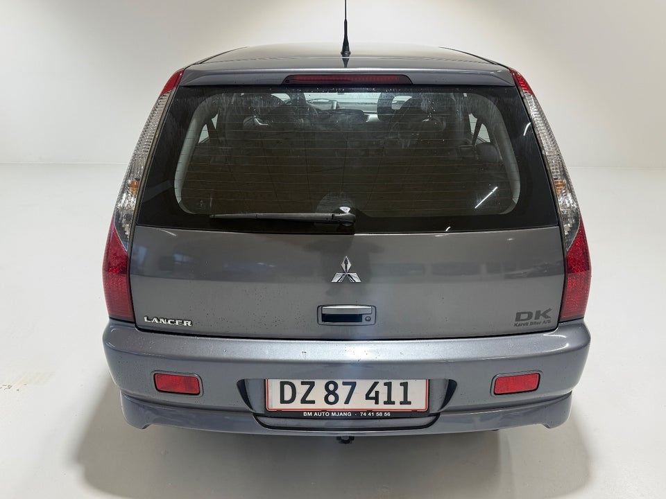 Mitsubishi Lancer 1,6 Invite stc. 5d