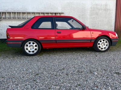 Annonce: Peugeot 309 1,9 GTi - Pris 139.900 kr.