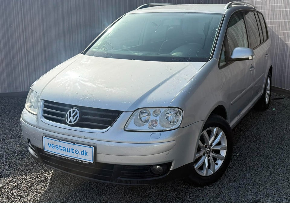 VW Touran 1,9 TDi 100 Highline DSG Van 5d