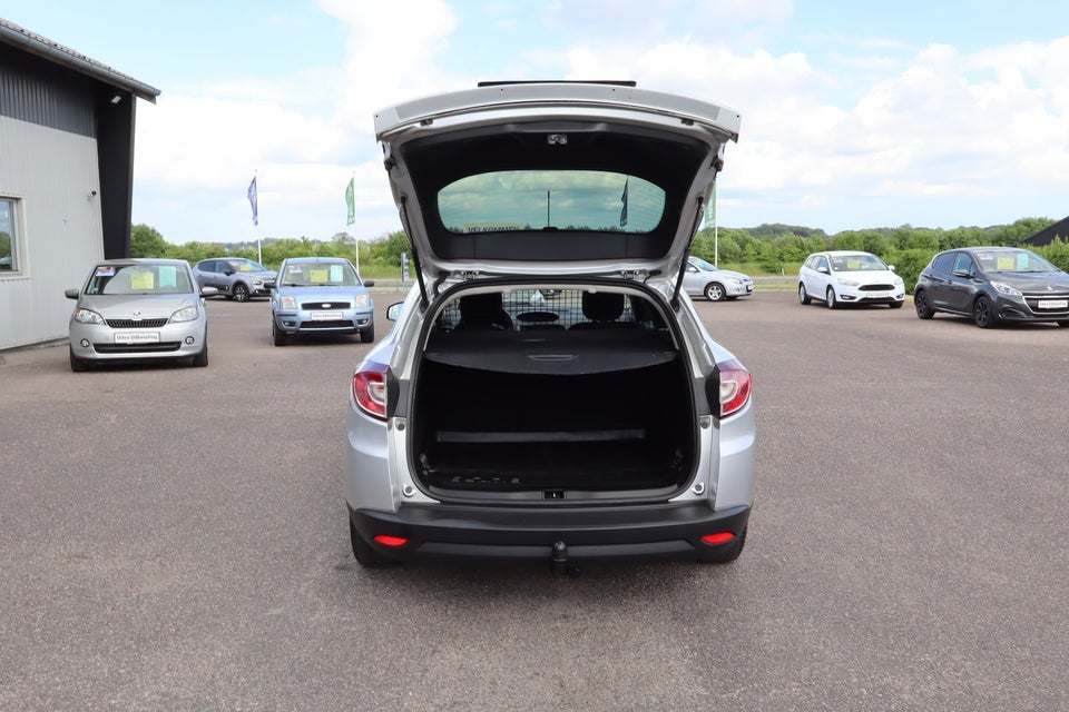 Renault Megane III 1,5 dCi 110 Expression Sport Tourer aut. 5d