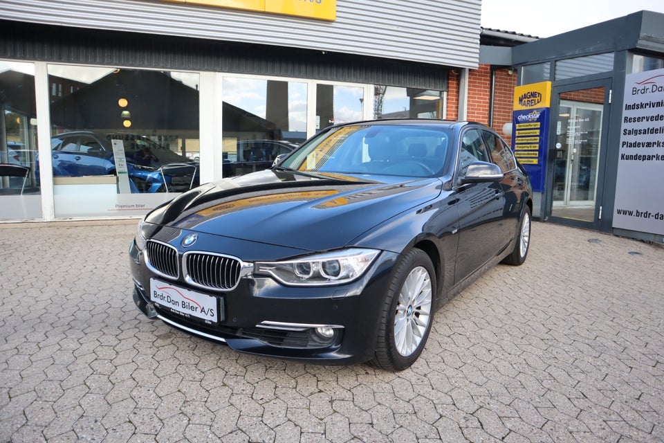 BMW 320i 2,0 aut. 4d