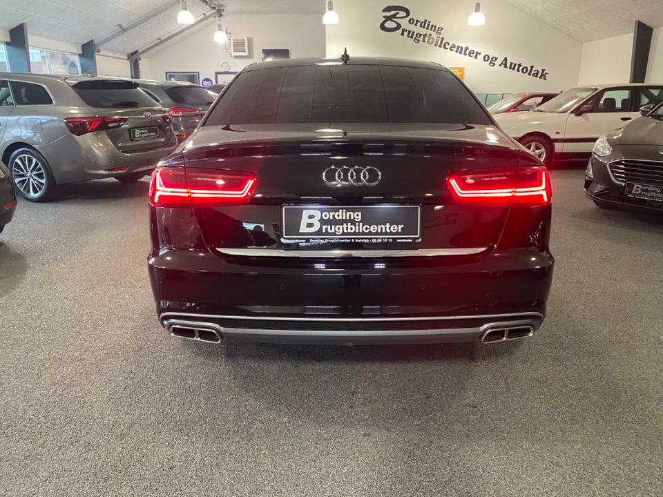 Audi A6 3,0 TDi 218 S-tr. 4d