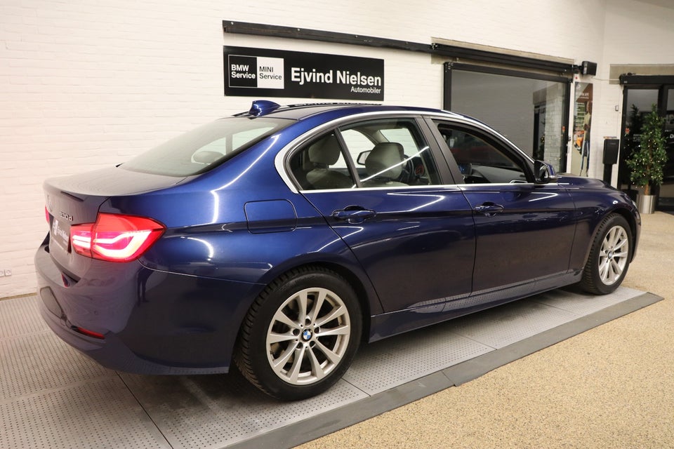 BMW 330d 3,0 Advantage aut. 4d