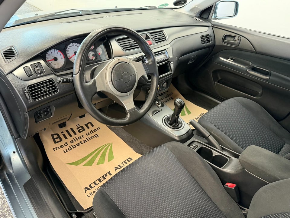 Mitsubishi Lancer 1,6 Comfort stc. 5d