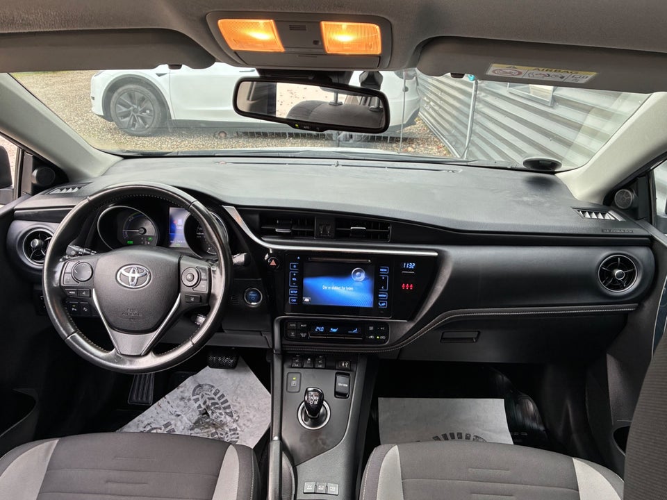 Toyota Auris 1,8 Hybrid H2 Comfort Touring Sports CVT 5d