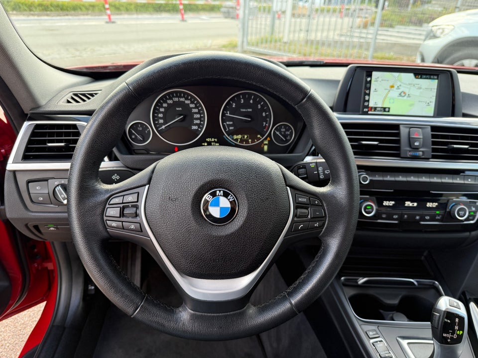BMW 320i 2,0 Touring Advantage aut. 5d