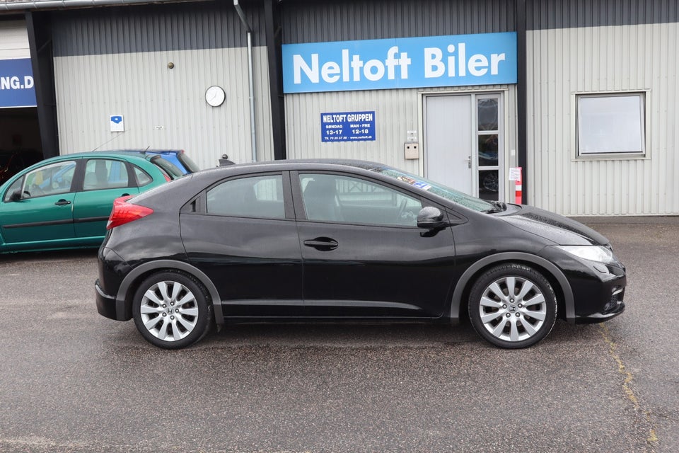 Honda Civic 1,8 i-VTEC Sport 5d