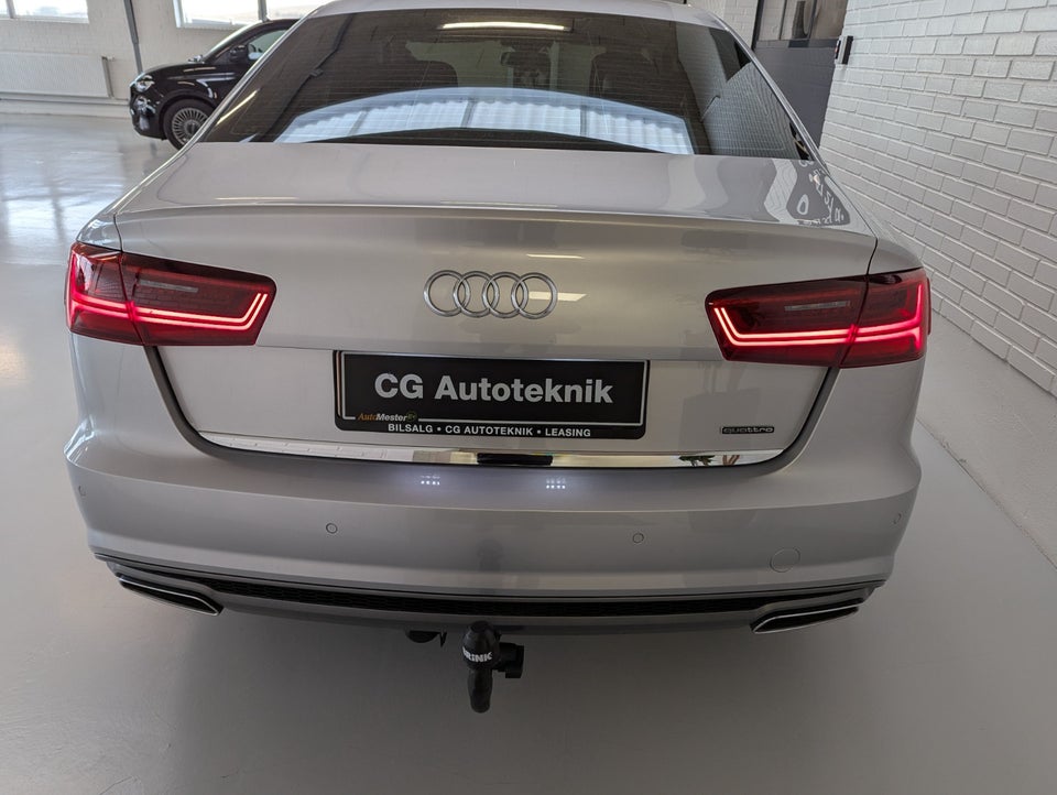 Audi A6 3,0 TDi 218 quattro S-tr. 4d
