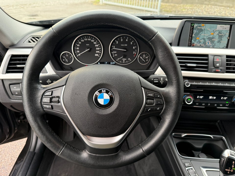 BMW 320i 2,0 Touring aut. 5d