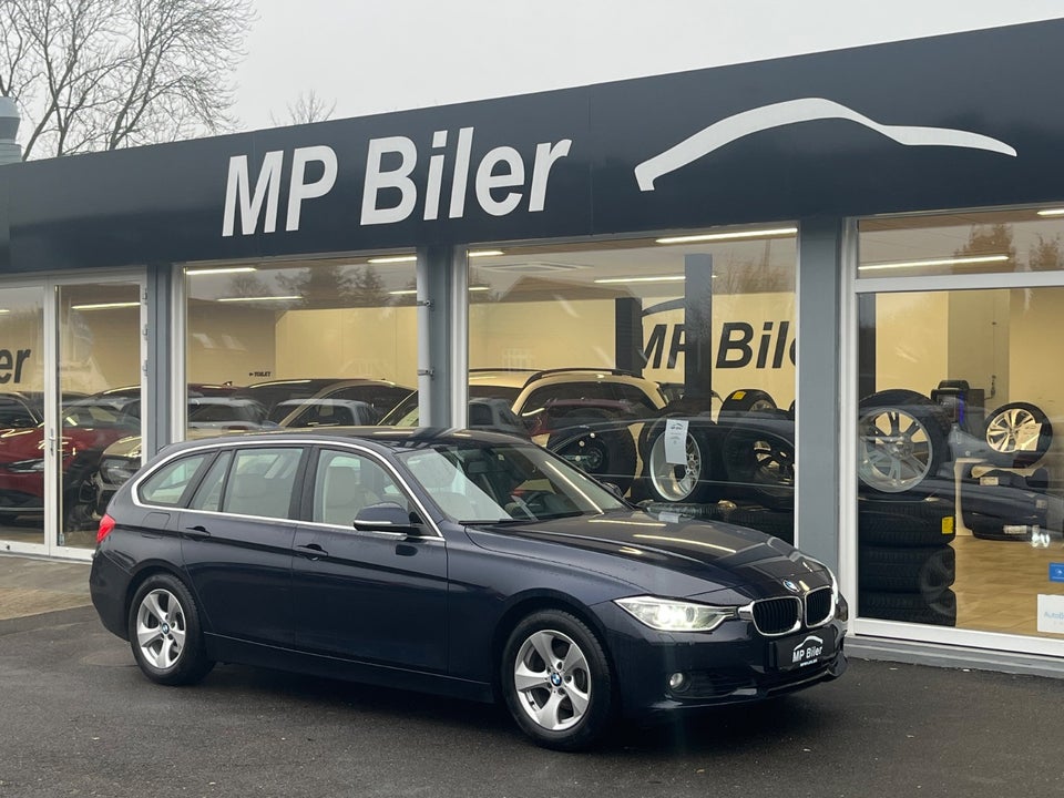 BMW 320i 2,0 Touring aut. 5d