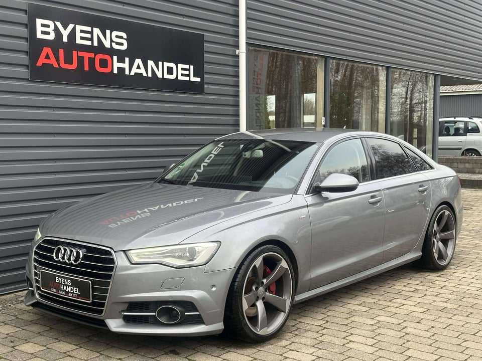 Audi A6 3,0 TDi 218 quattro S-tr. 4d