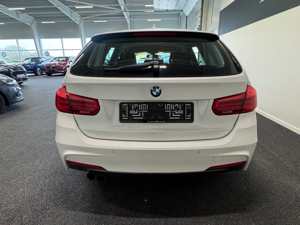 BMW 320i 2,0 Touring aut. 5d