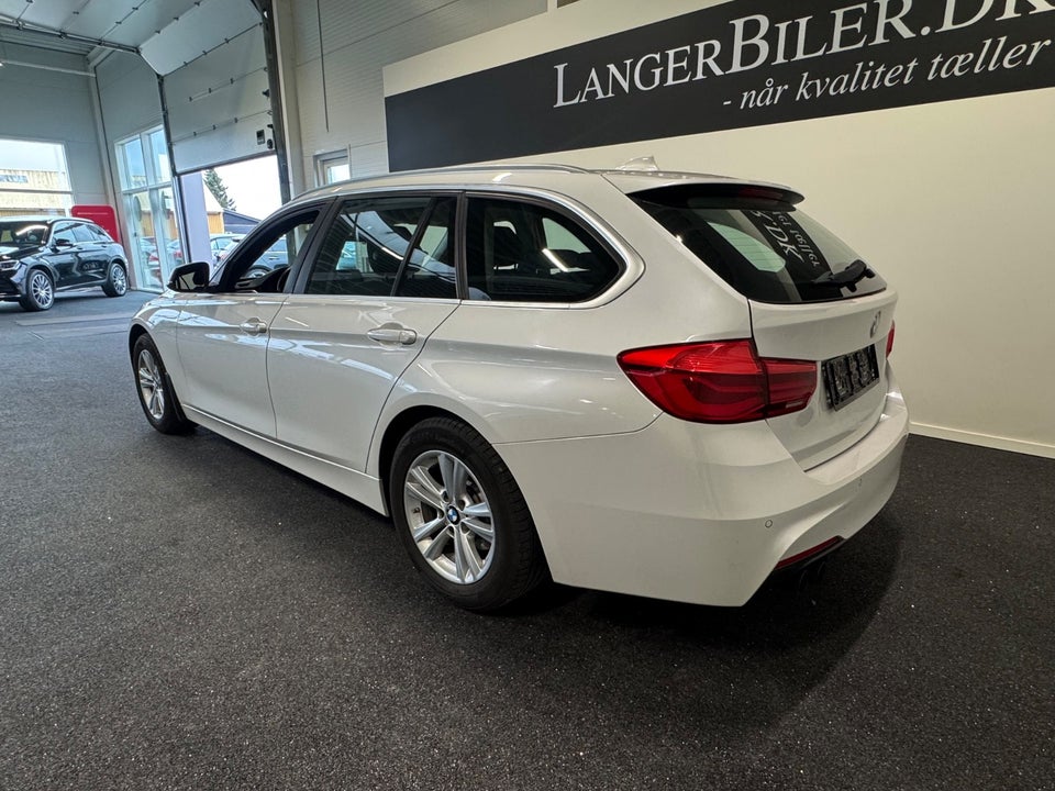 BMW 320i 2,0 Touring aut. 5d