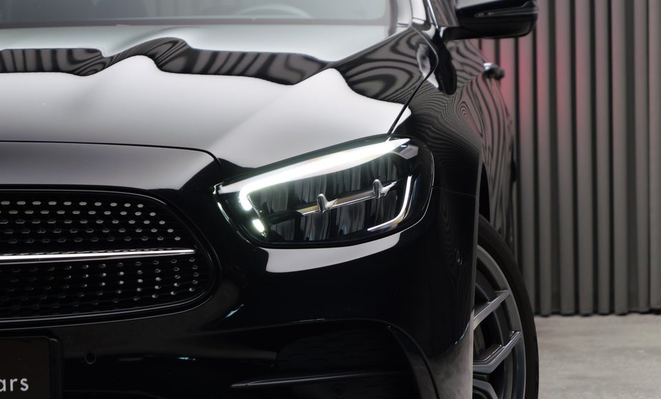 Mercedes E300 e 2,0 AMG Line aut. 4Matic 4d