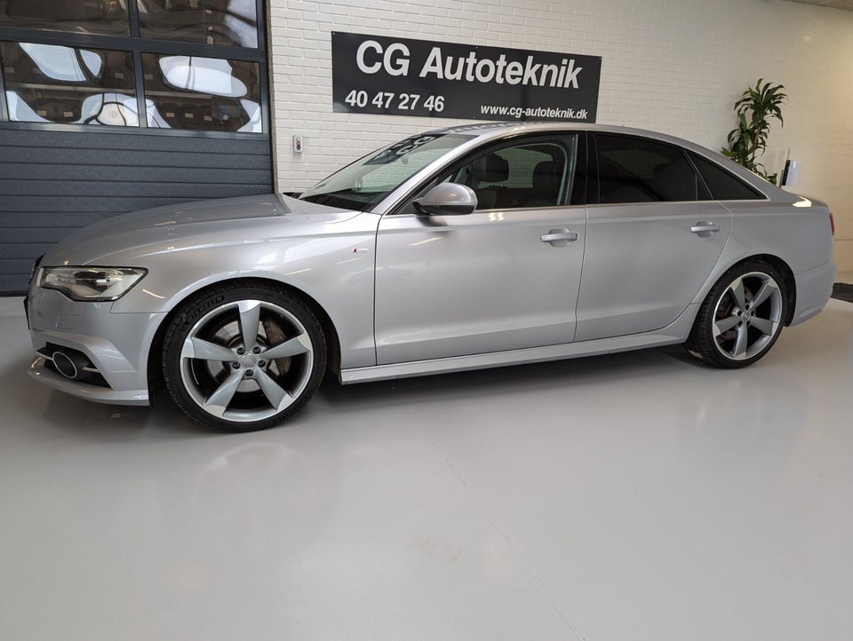 Audi A6 3,0 TDi 218 quattro S-tr. 4d