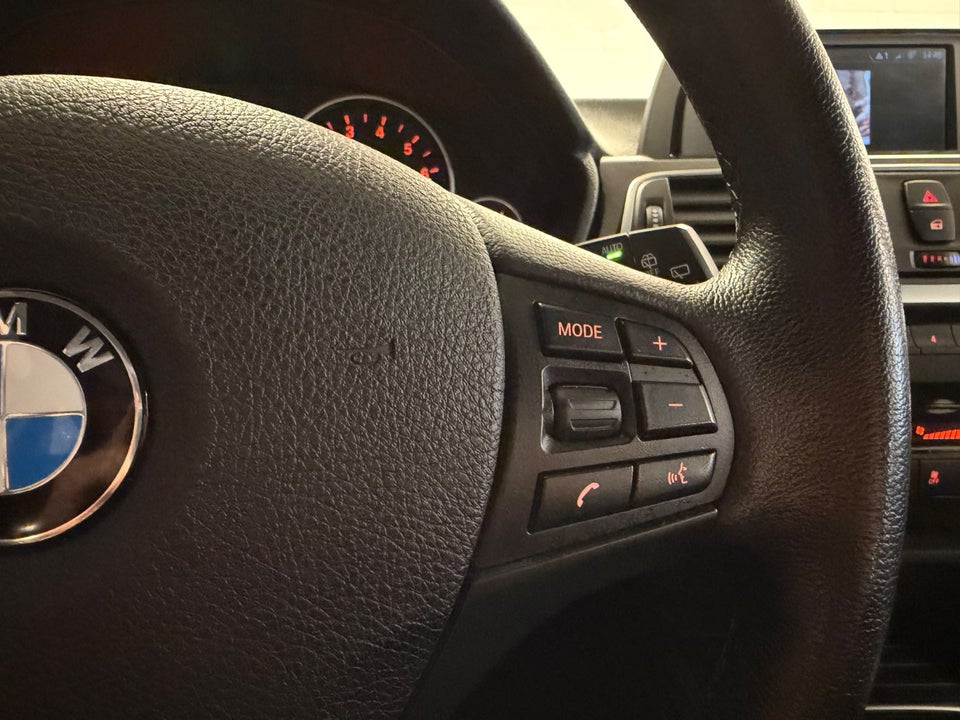 BMW 320i 2,0 Touring Advantage aut. 5d