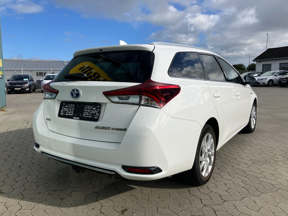 Toyota Auris 1,8 Hybrid H2 Comfort Touring Sports CVT 5d