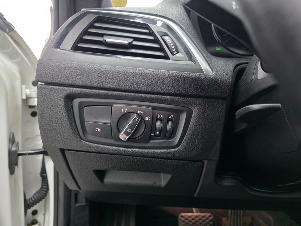 BMW 118i 1,5 Advantage aut. 5d