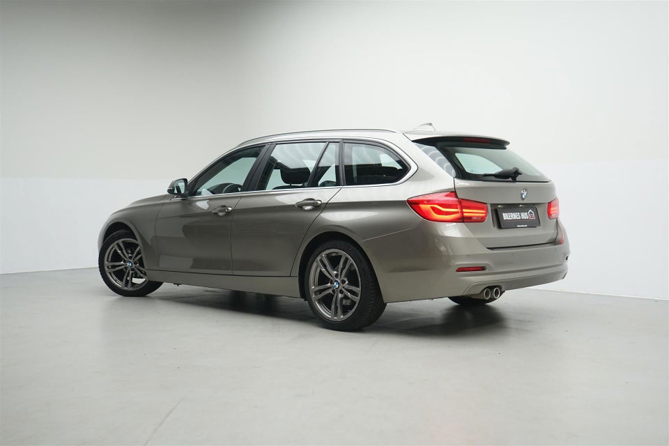 BMW 320i 2,0 Touring Executive aut. 5d