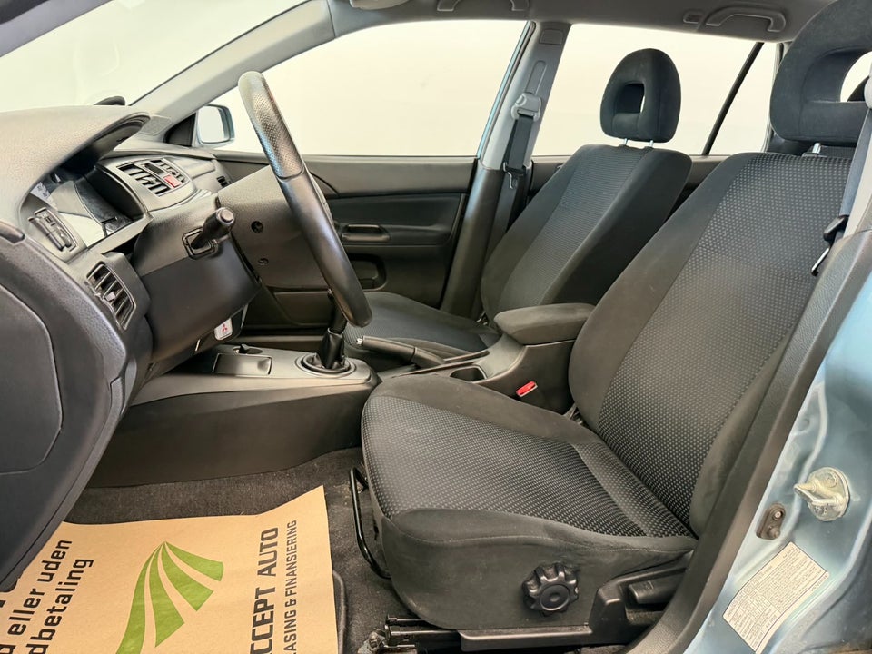 Mitsubishi Lancer 1,6 Comfort stc. 5d