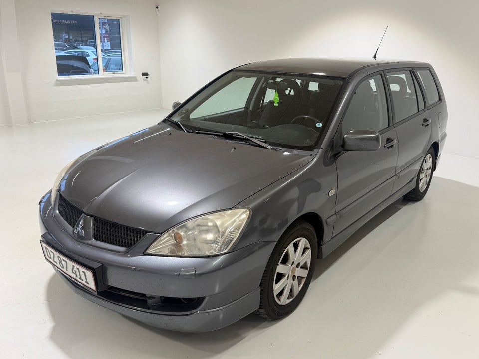 Mitsubishi Lancer 1,6 Invite stc. 5d