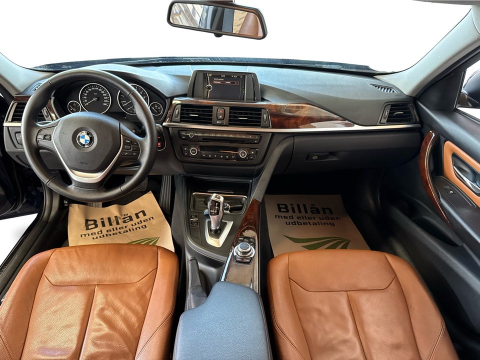 BMW 320i 2,0 aut. 4d