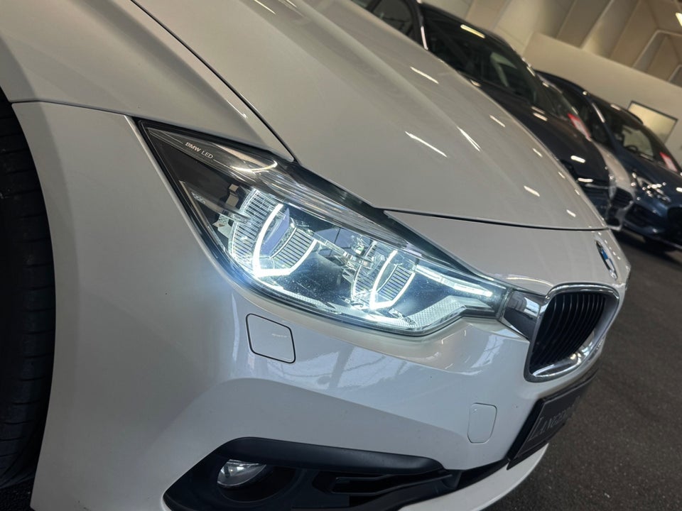 BMW 320i 2,0 Touring aut. 5d