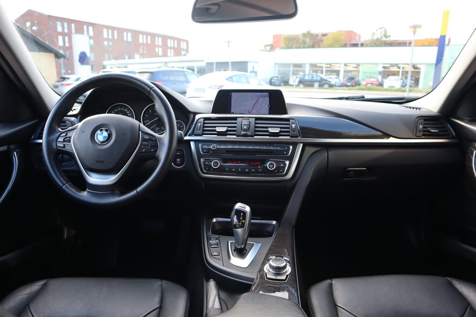 BMW 320i 2,0 aut. 4d