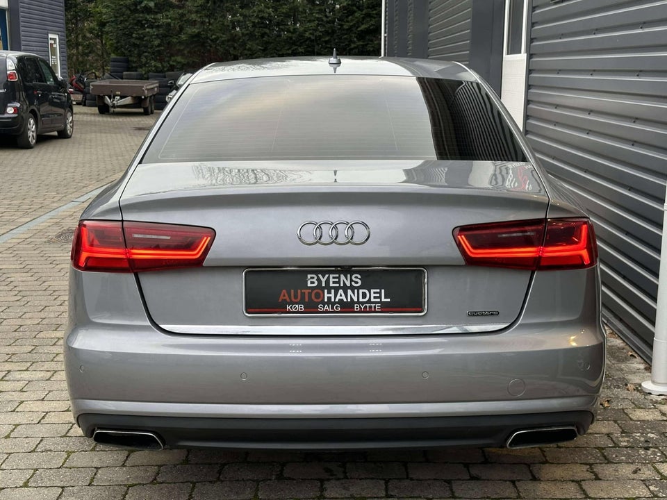 Audi A6 3,0 TDi 218 quattro S-tr. 4d