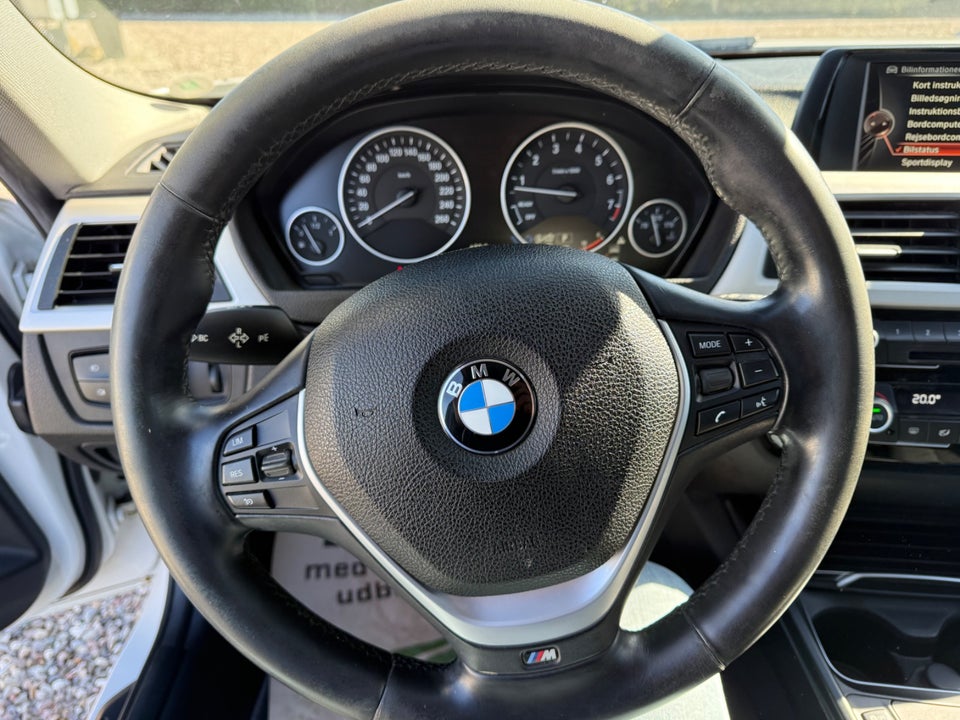 BMW 330i 2,0 Touring aut. 5d
