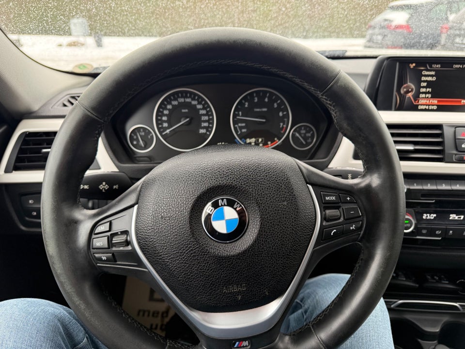 BMW 330i 2,0 Touring aut. 5d
