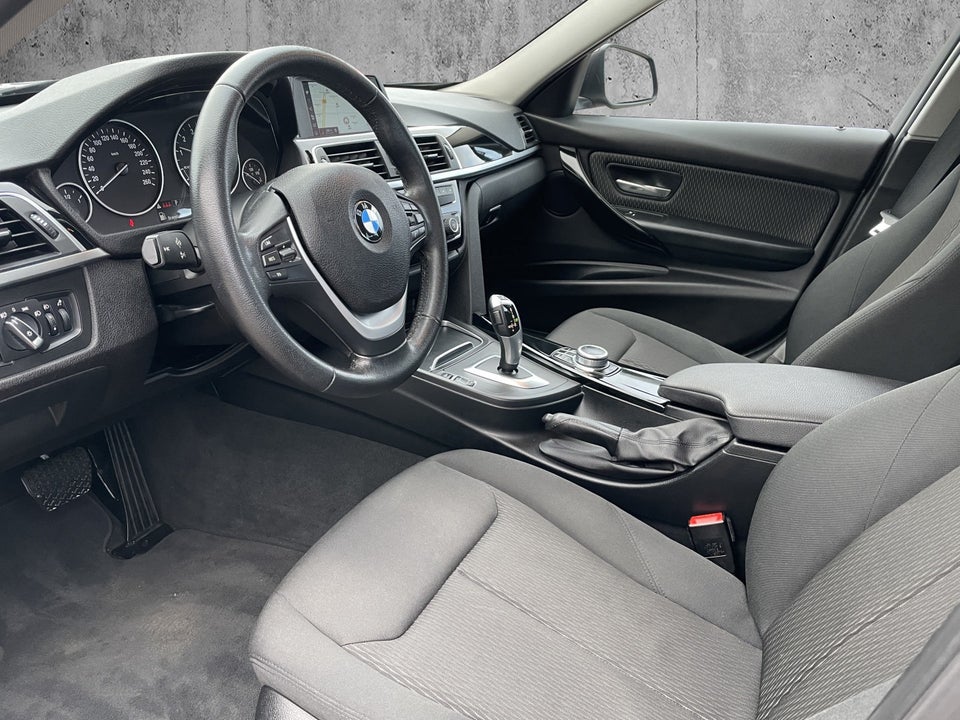 BMW 320i 2,0 Advantage aut. 4d