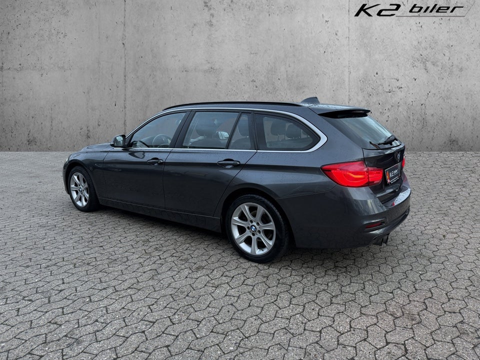 BMW 320i 2,0 Touring aut. 5d