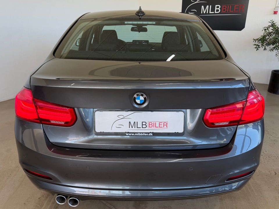BMW 320i 2,0 Advantage aut. 4d