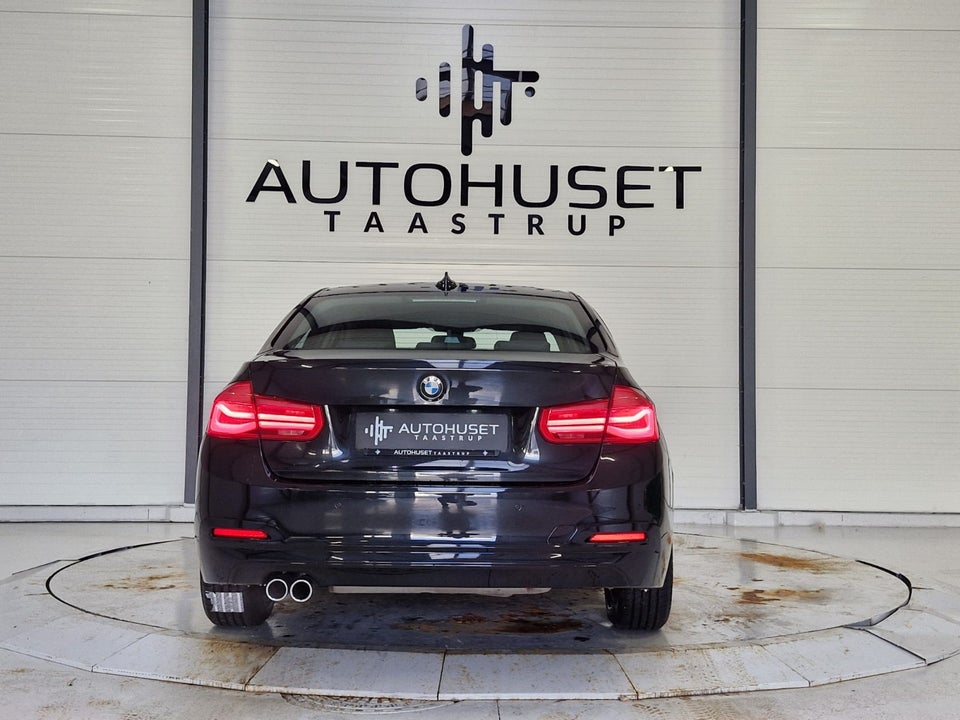 BMW 320i 2,0 Advantage aut. 4d