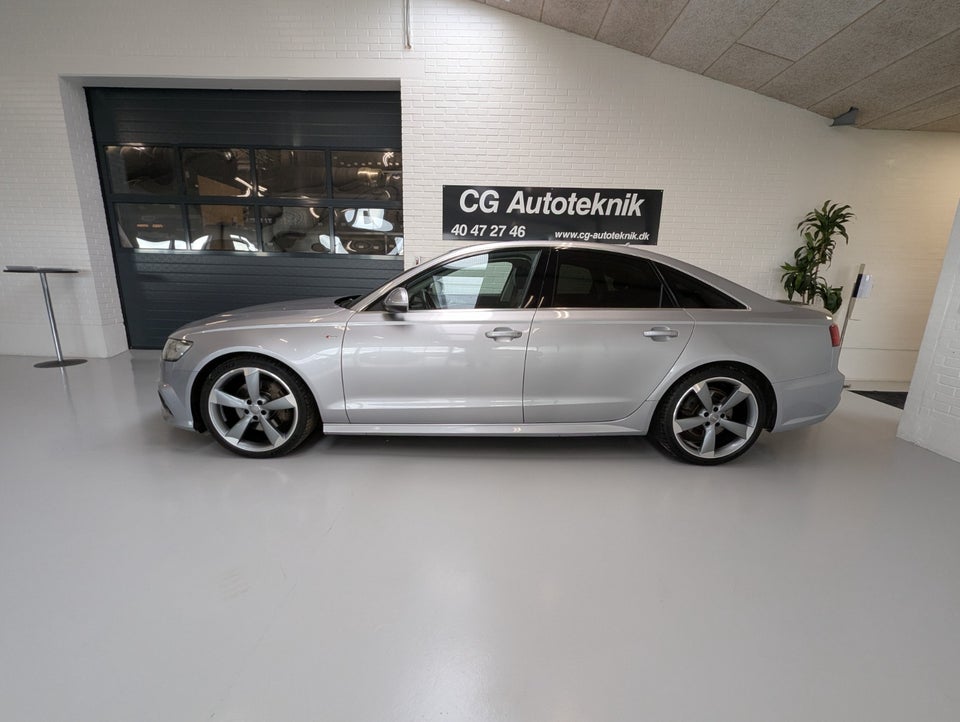 Audi A6 3,0 TDi 218 quattro S-tr. 4d