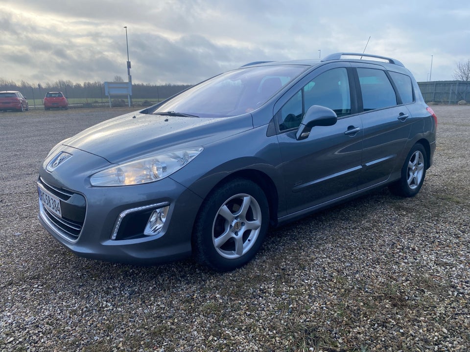 Peugeot 308 1,6 e-HDi 112 Sportium SW 5d