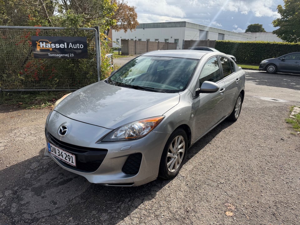 Mazda 3 1,6 DE 115 Premium 4d