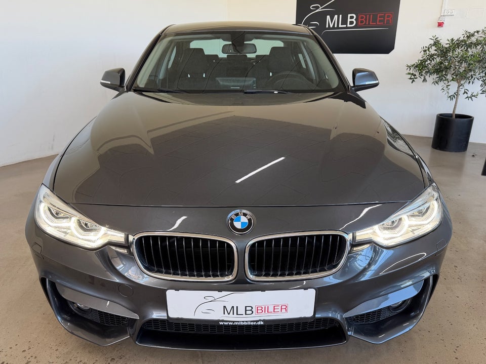 BMW 320i 2,0 Advantage aut. 4d
