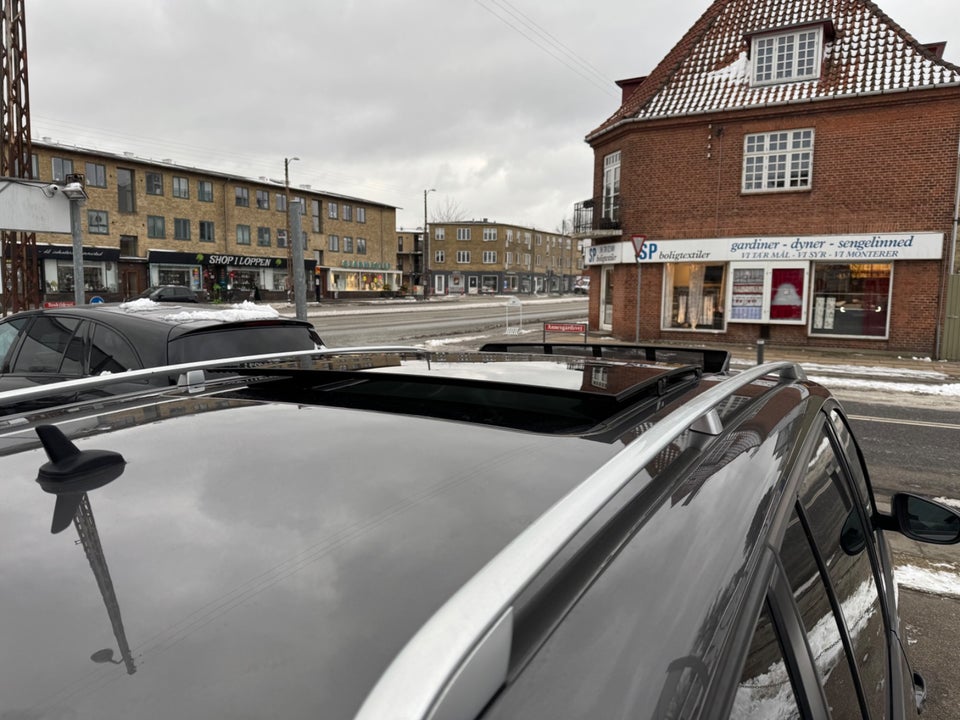 VW Touran 1,6 TDi 105 Highline DSG BMT 7prs 5d