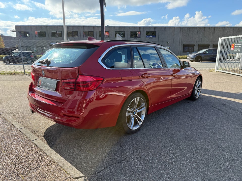BMW 320i 2,0 Touring Advantage aut. 5d